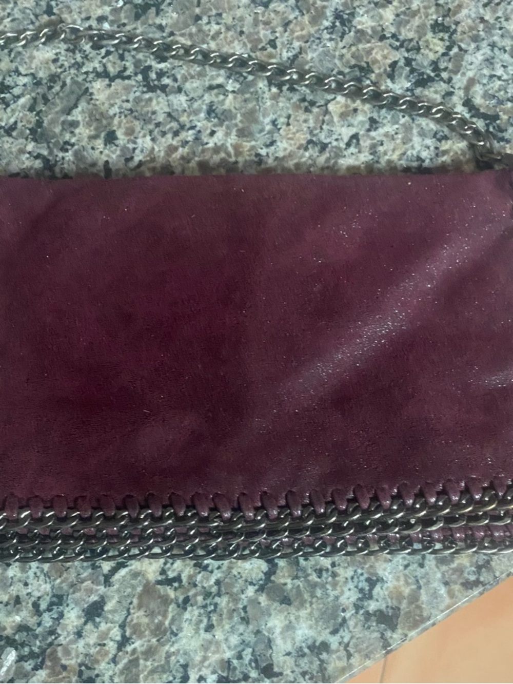 Deep Burgundy bag with chain.